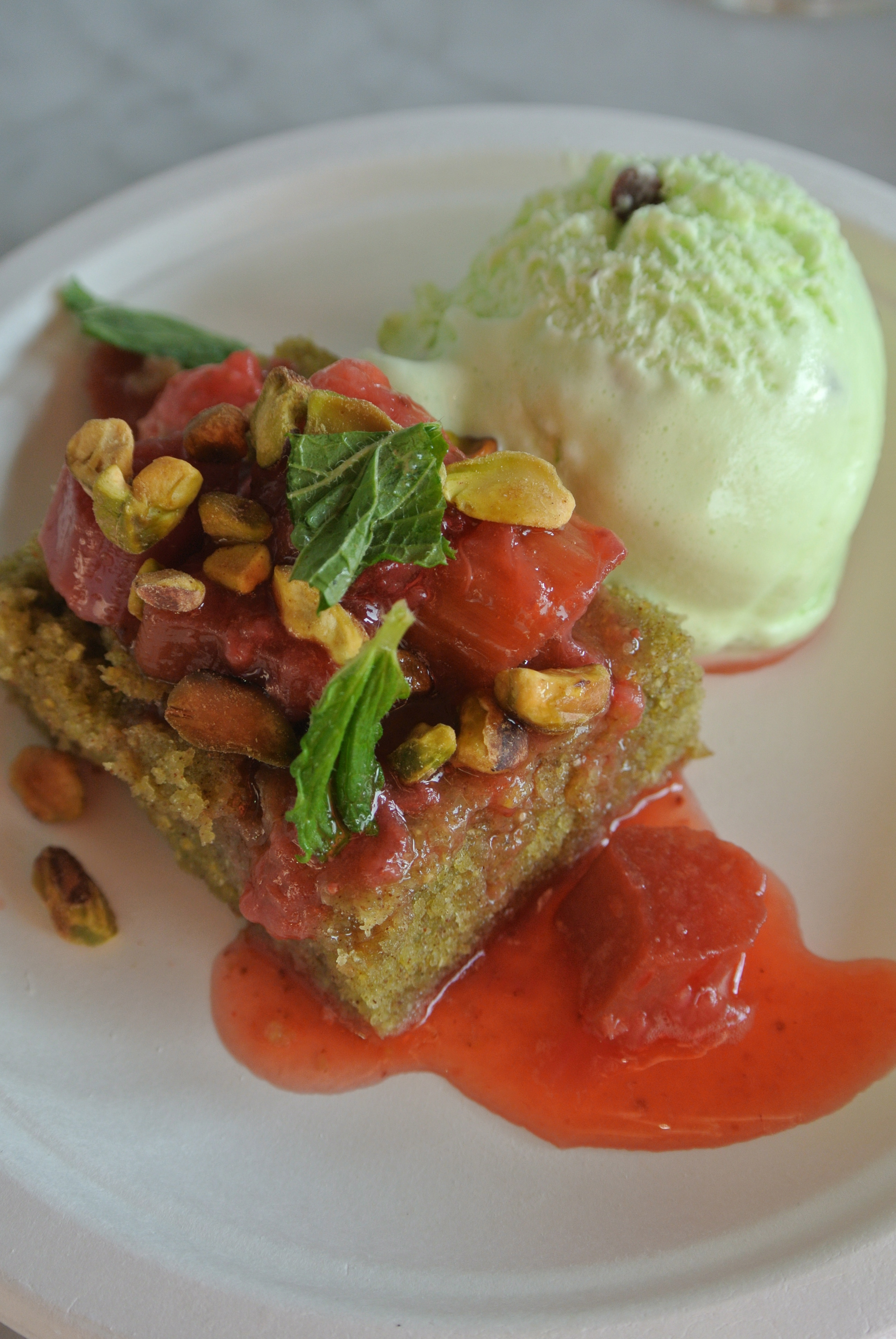 The Harbord Room's rhubarb, strawberry and pistachio upside-down cake, mint ice cream and preserved strawberries.