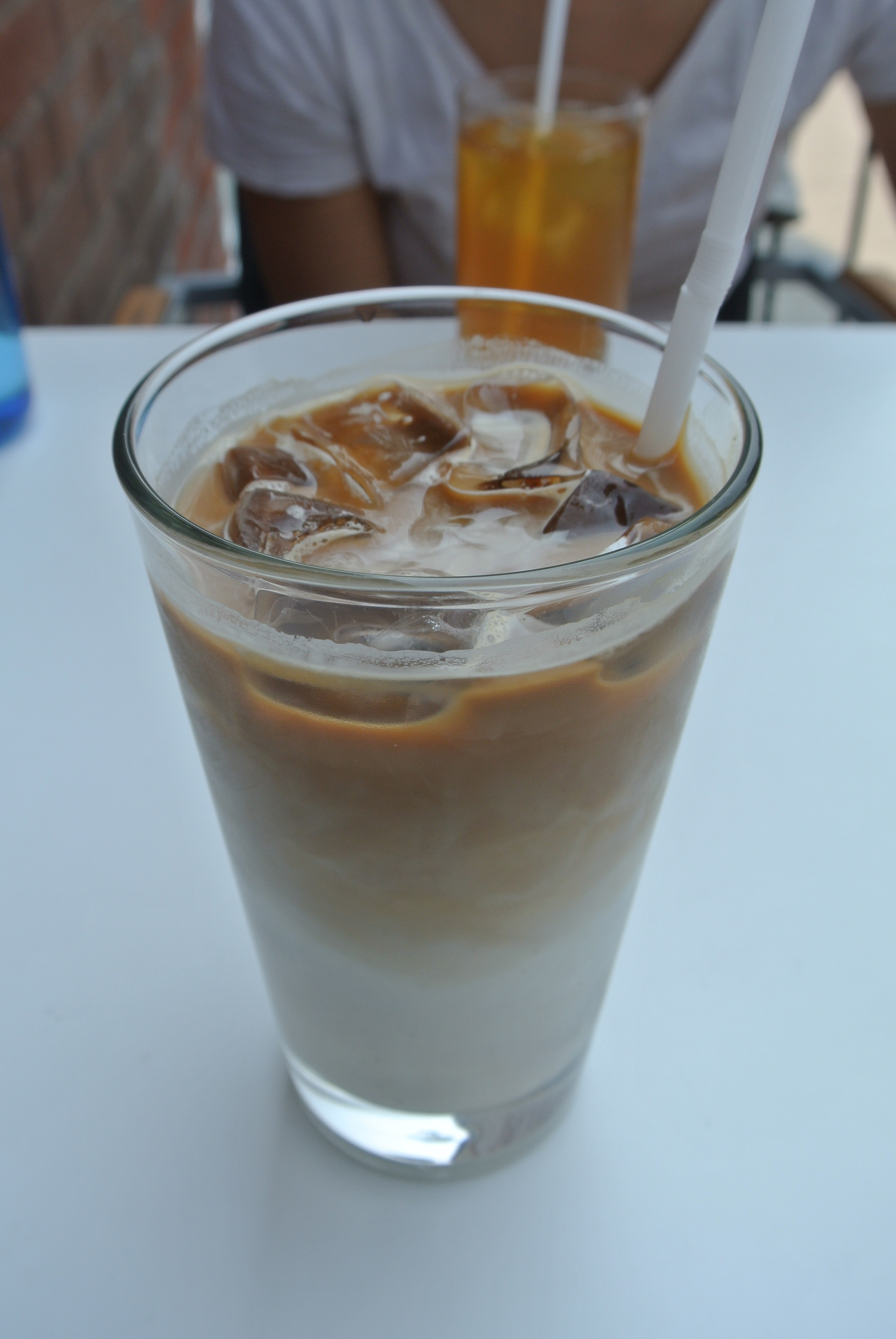 A large iced latte to stay.