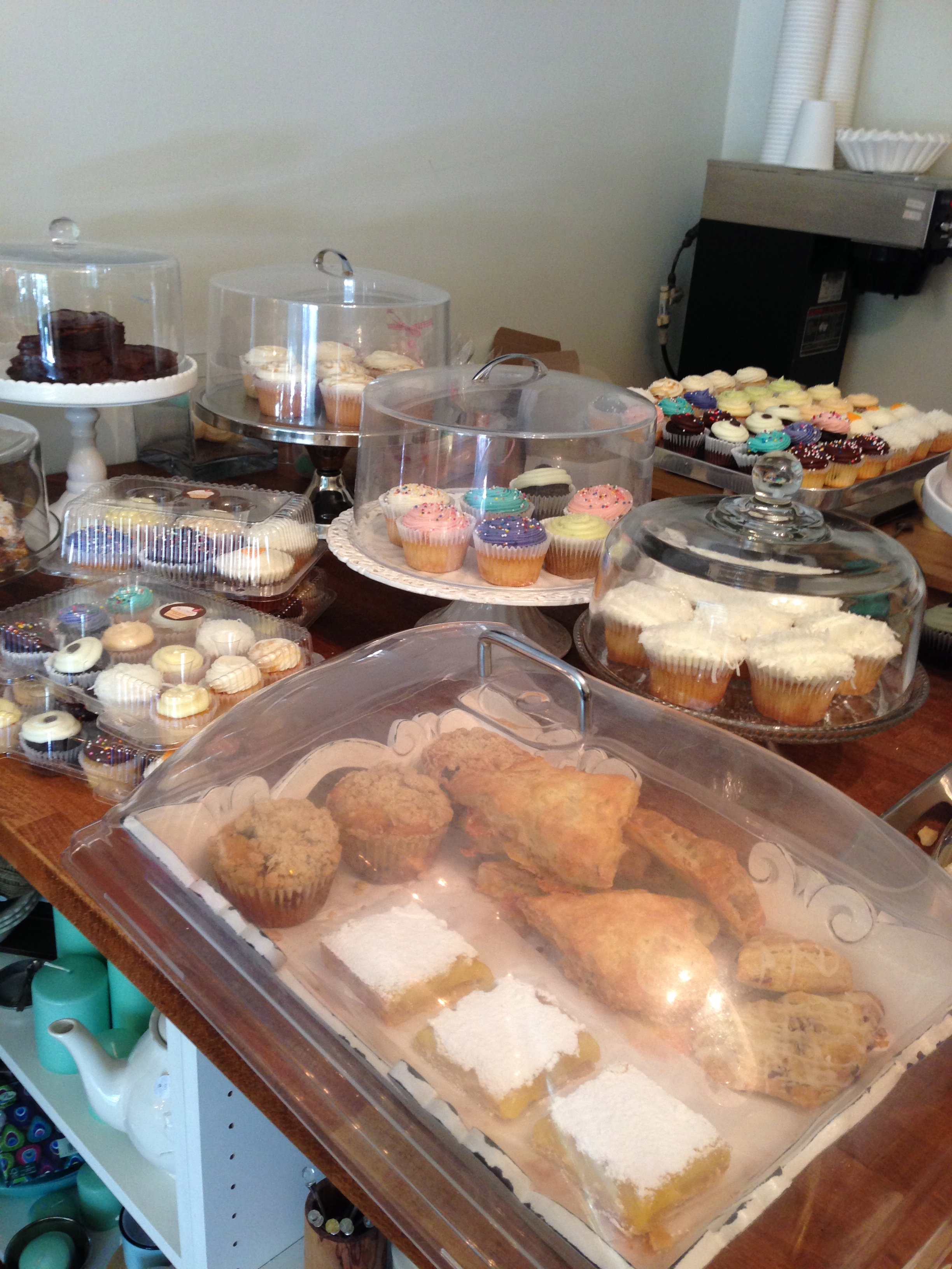 A counter full of delicious baked goods.