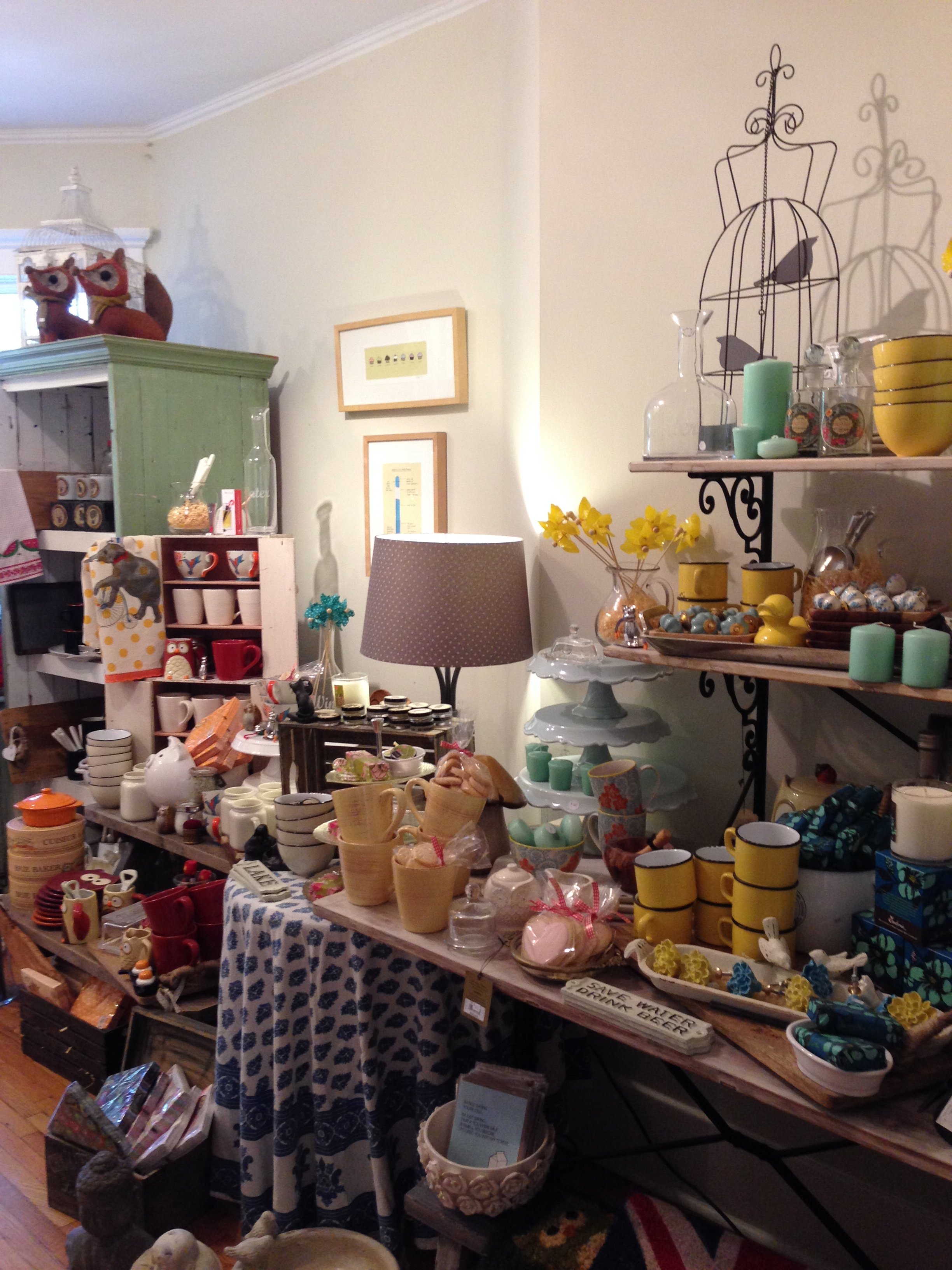 The back room full of beautiful items for the kitchen and home.