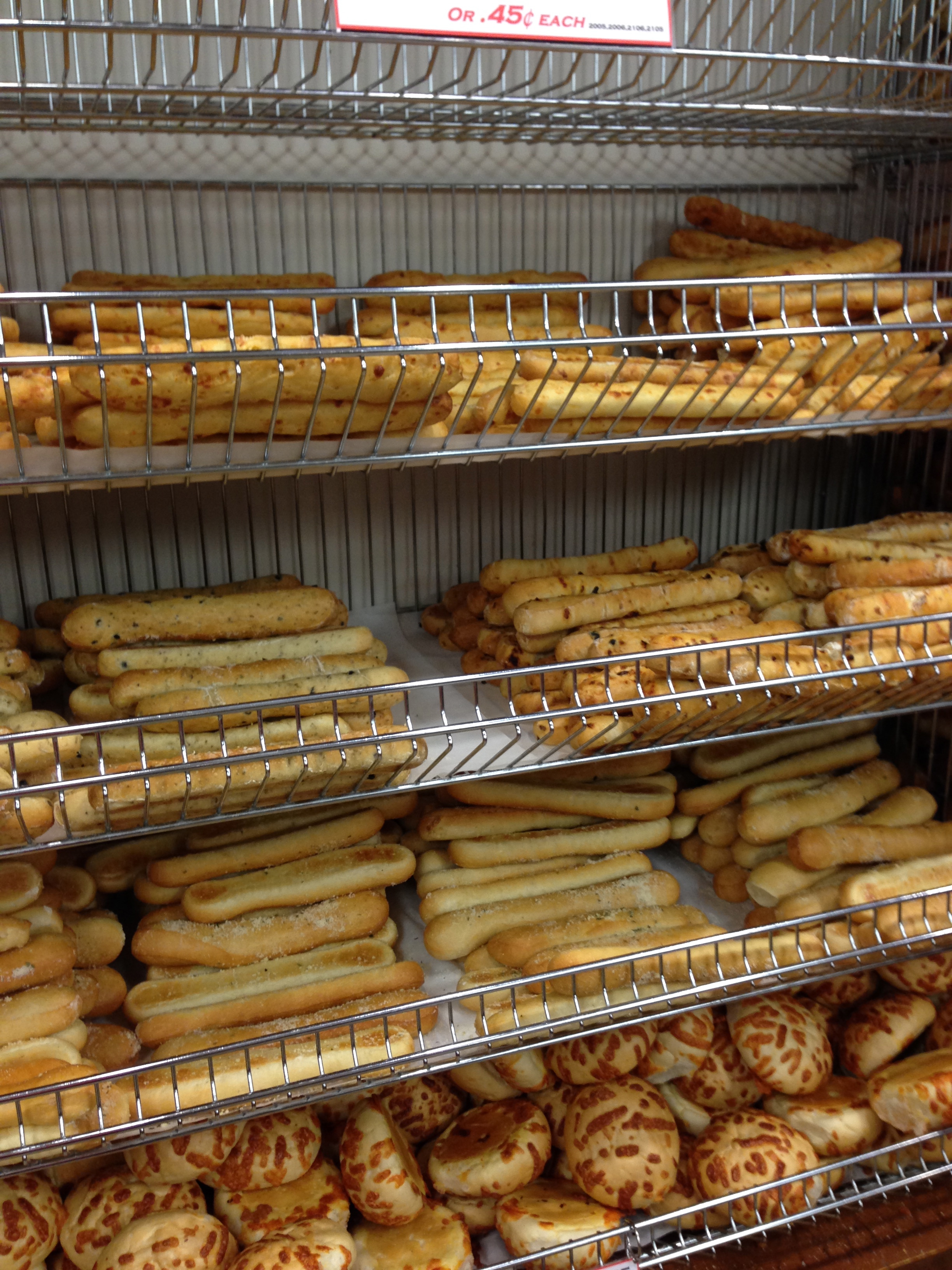 So many different types of bread sticks - garlic, cheese, sundried tomato and olive.